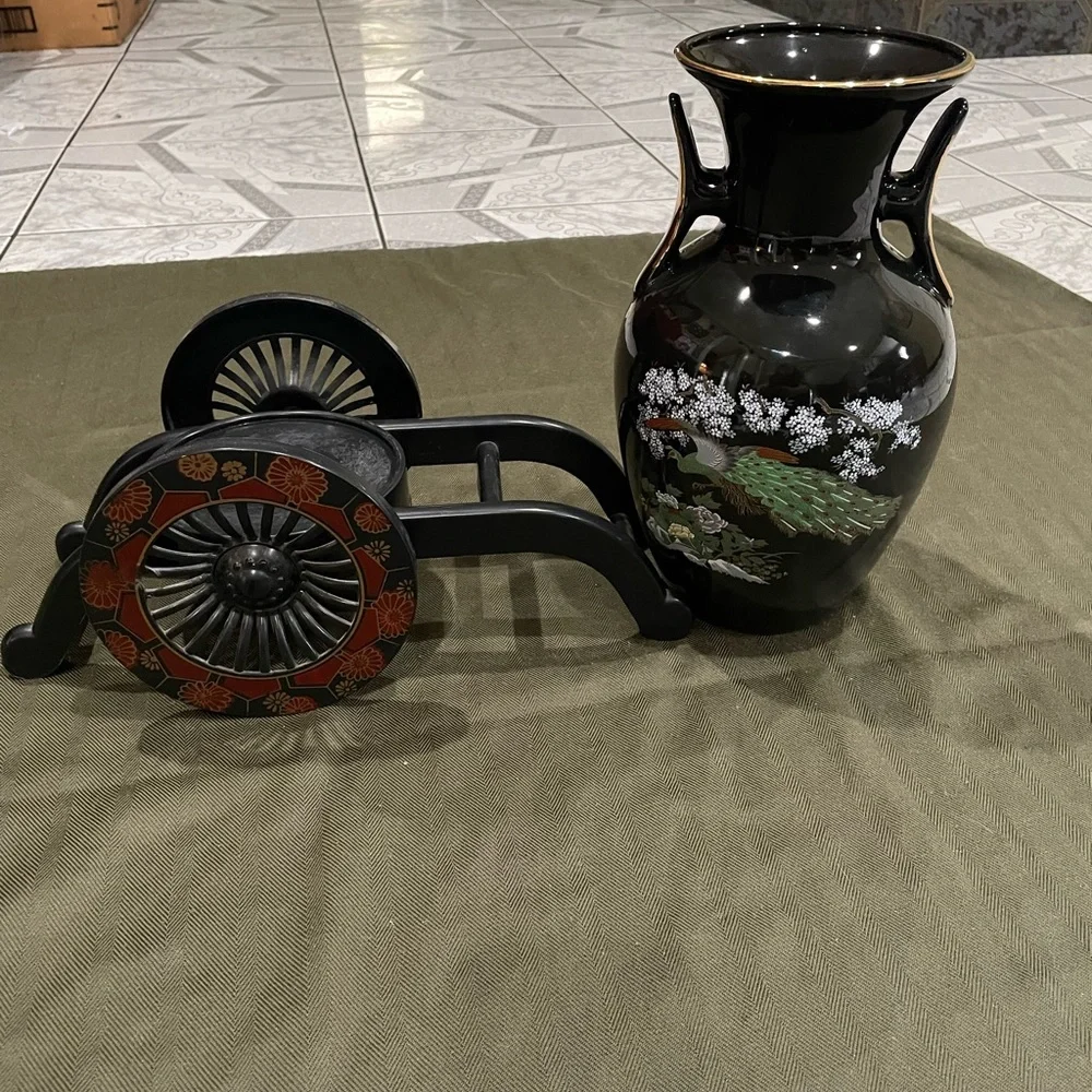 Elegant Black Floral Vase with Stand the card has a broken bar but it doesn’t